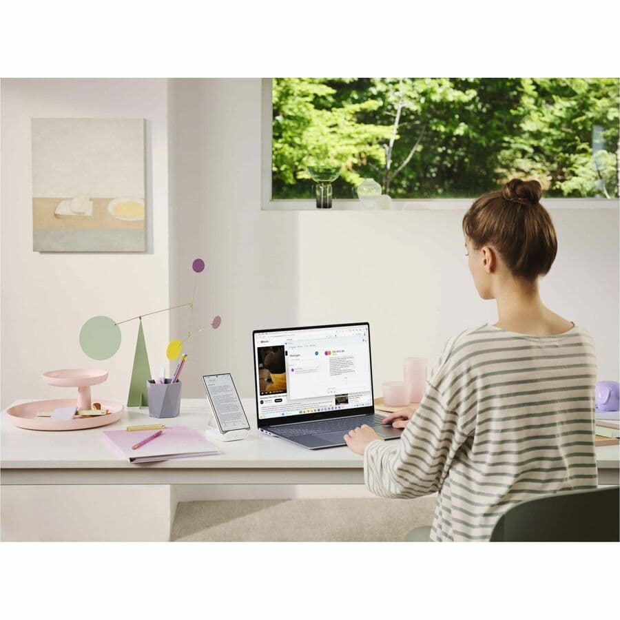 Samsung Galaxy Book4 Edge 14-inch laptop in Sapphire Blue with slim portable design