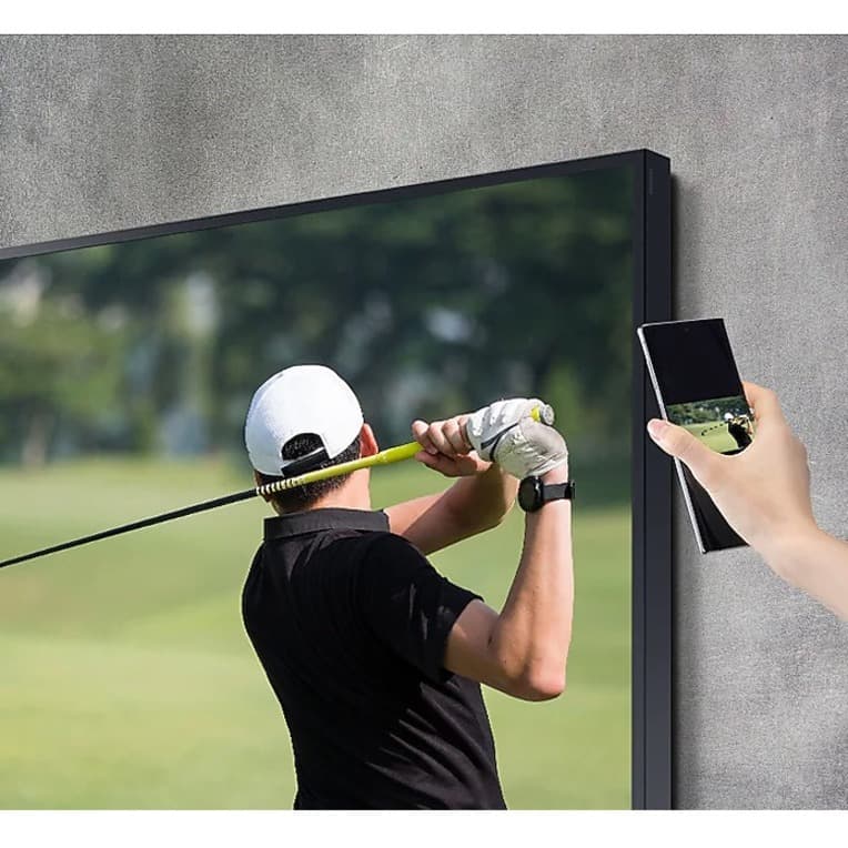 Samsung 65-inch Terrace QLED outdoor TV mounted on a patio wall