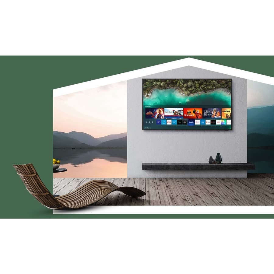 Samsung 65-inch Terrace QLED outdoor TV mounted on a patio wall