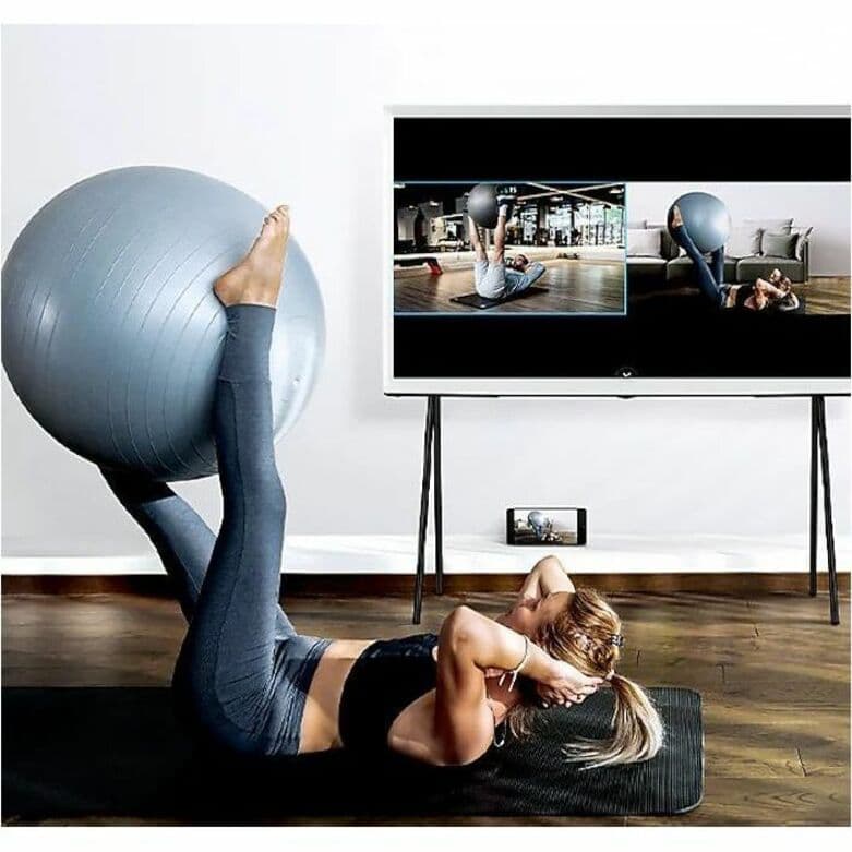 Samsung 55-inch QLED 4K smart TV with Ambient Mode+, detachable easel stand, and slim framed design